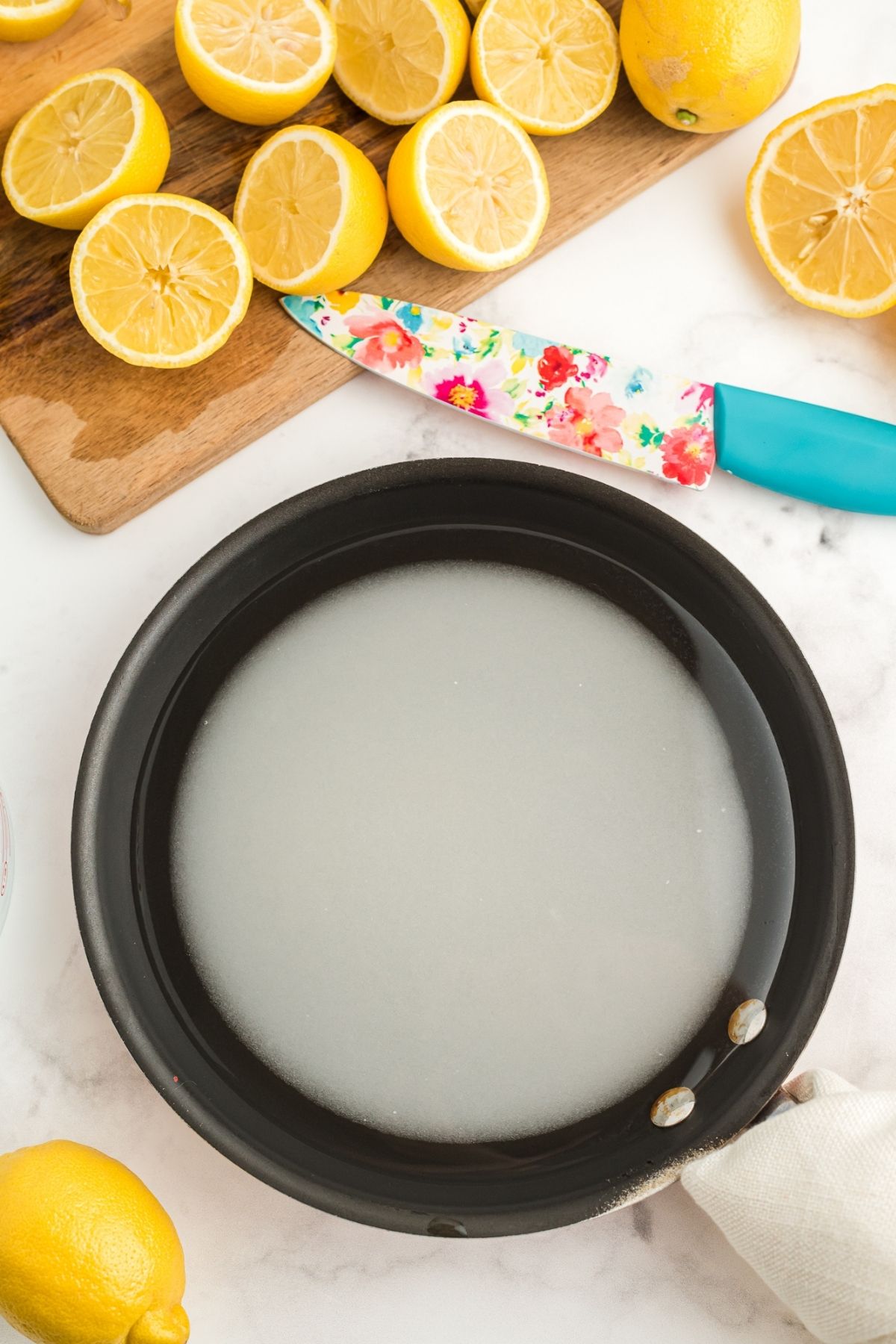 sauce pan with sugar and water