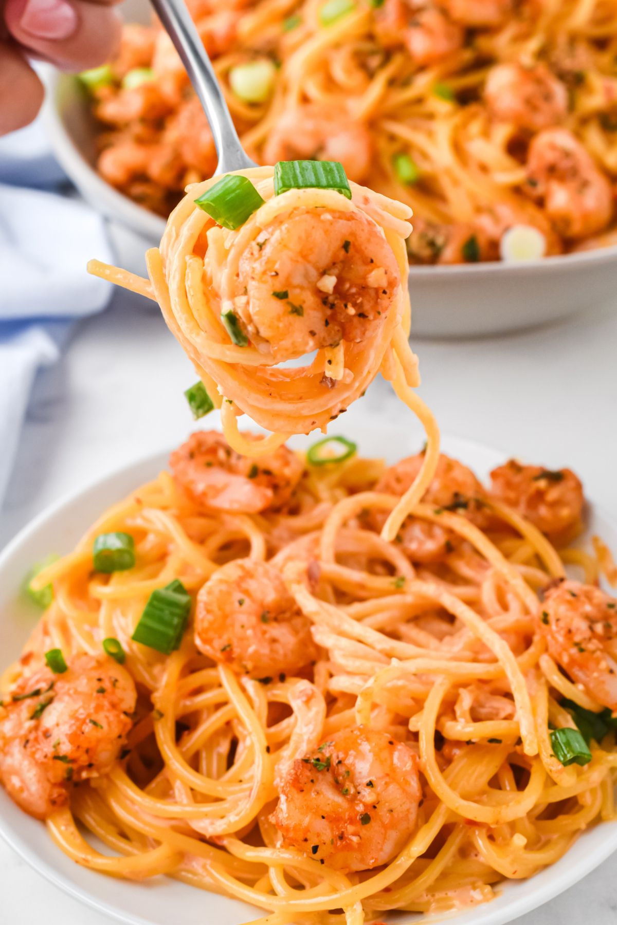 twirled pasta on fork - bang bang shrimp pasta