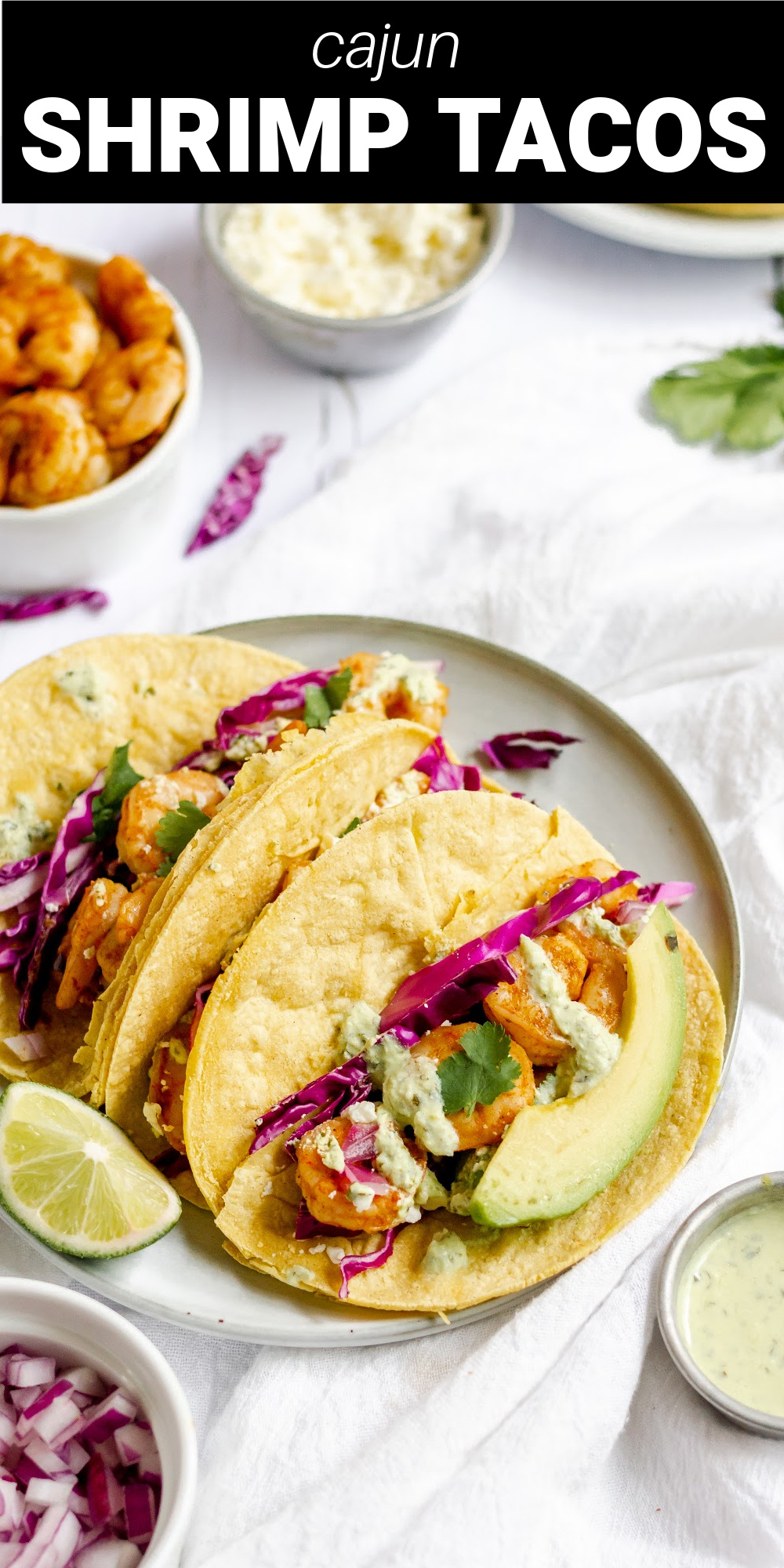 Cajun Shrimp Tacos with cilantro lime crema are bursting with amazing flavor and are a great way to change up Taco Tuesday. Pan seared shrimp seasoned with Cajun spices are nestled in a warm tortilla with a cool and refreshing homemade crema creating one delicious meal!