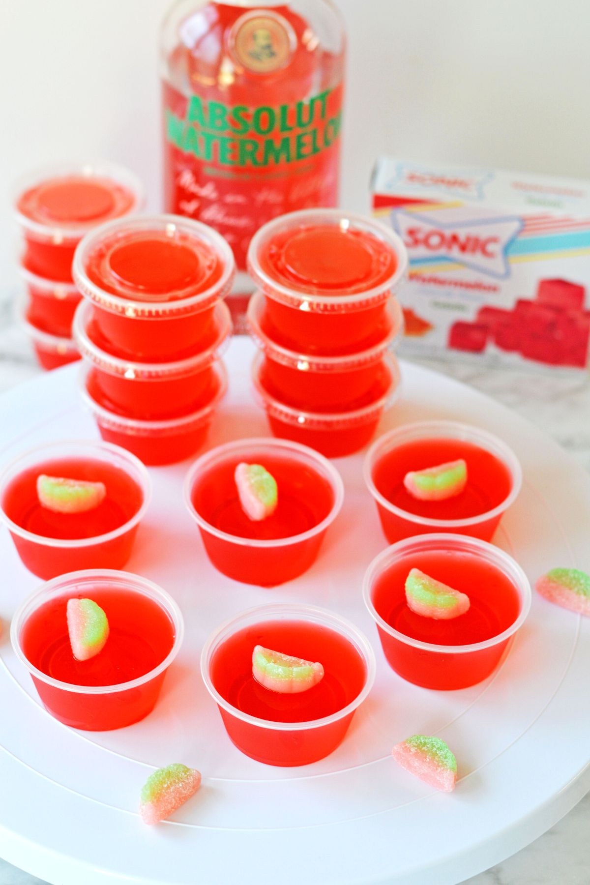 red jello shots with candy watermelon on top