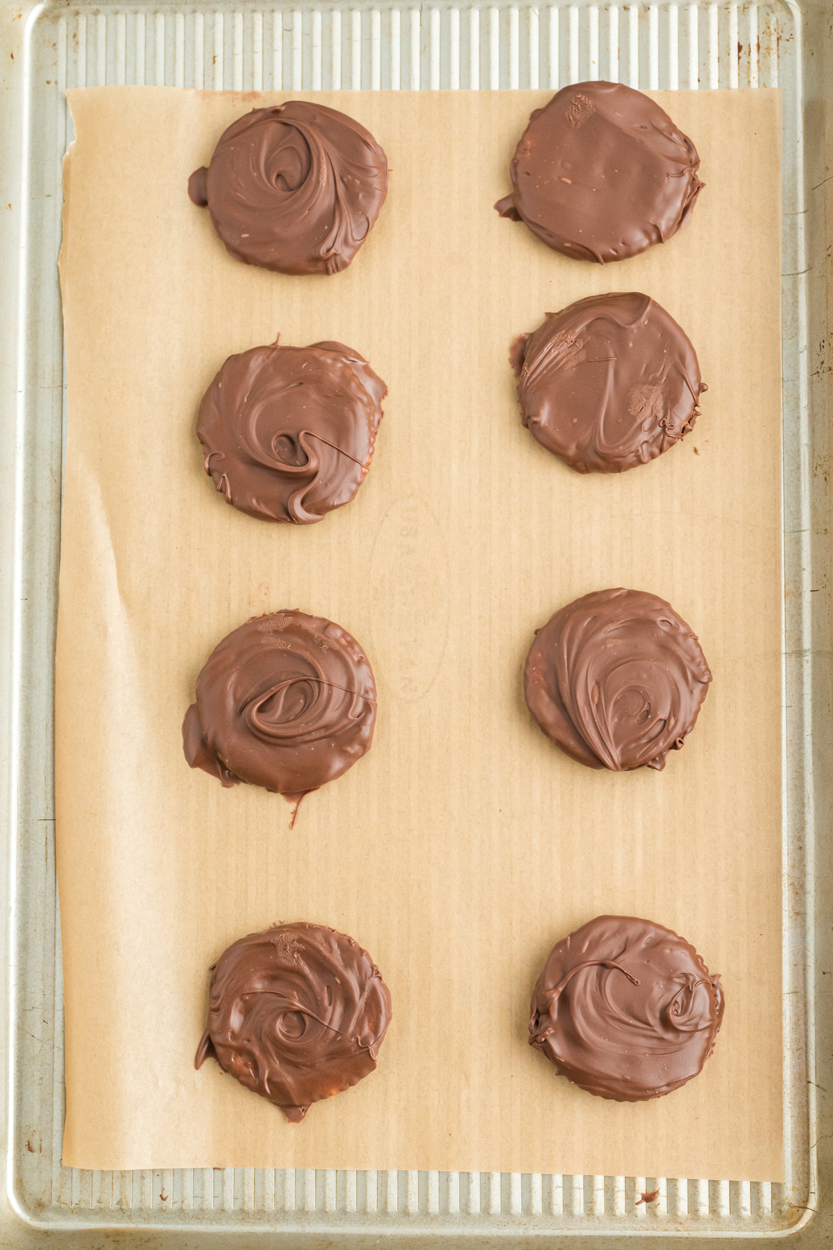 Thin Mints Ritz Cookies on a tray ready for freezing. 