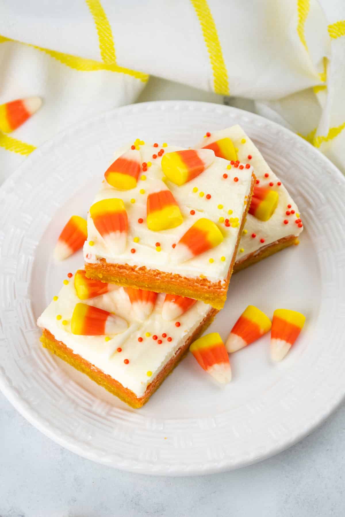 Candy Corn Cookie Bars on a white dish