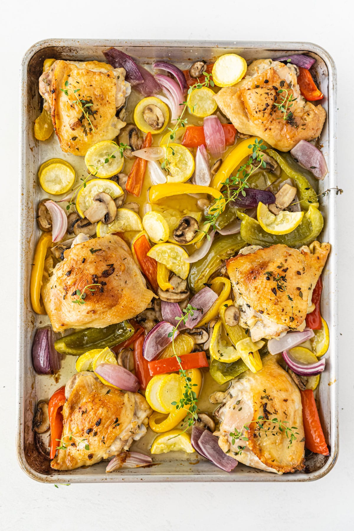 A tray of cooked Sheet pan Chicken Thighs