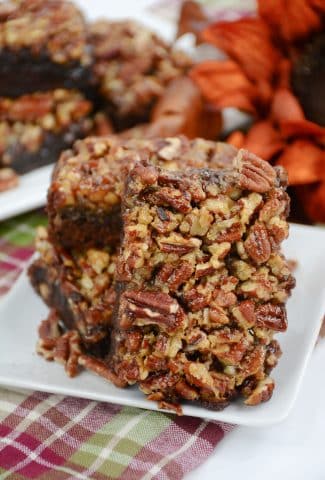 A closer look at Pecan Pie Brownies on a white plate