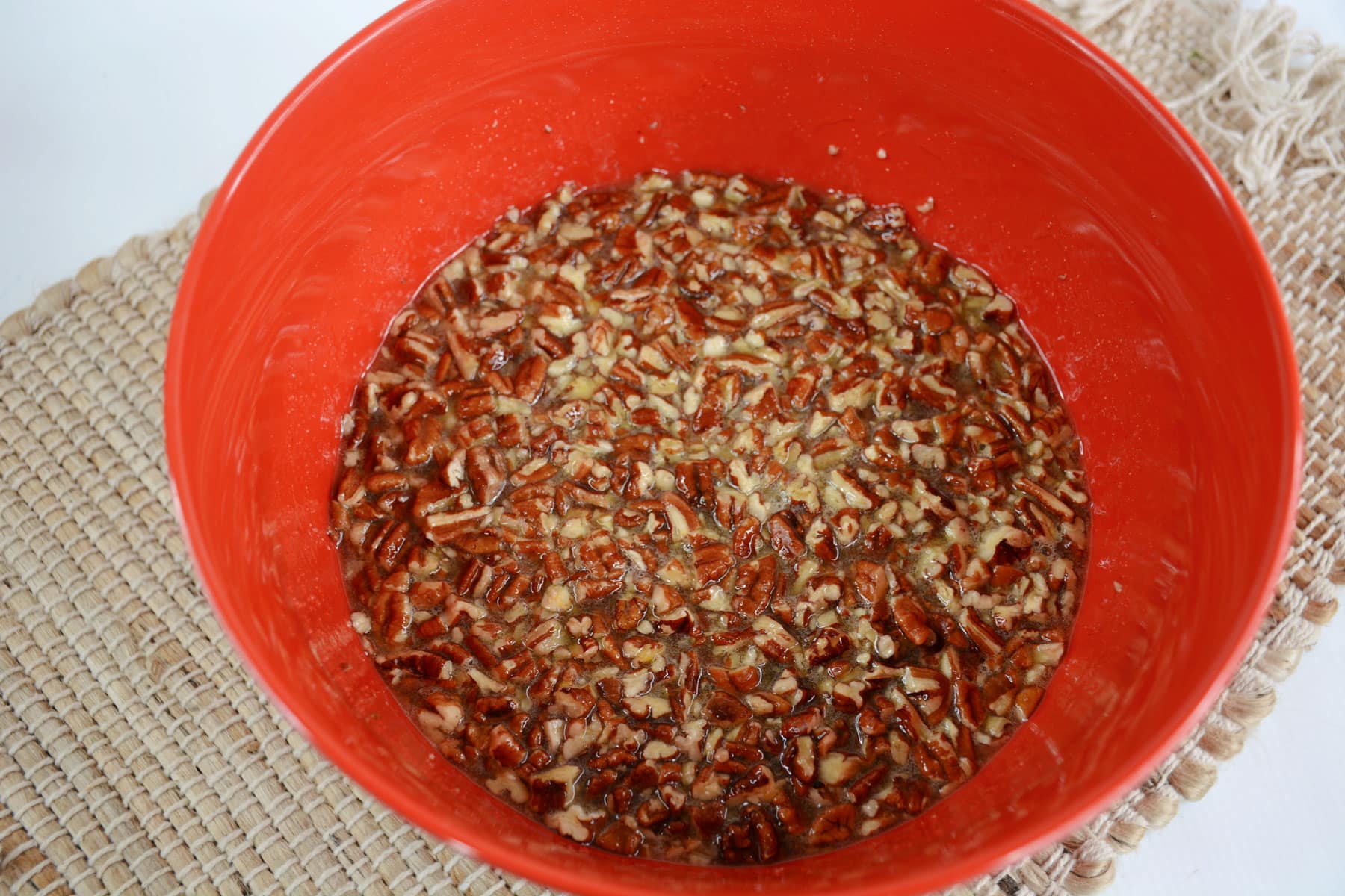 Chopped pecans on a bowl for Pecan Pie Brownies recipe