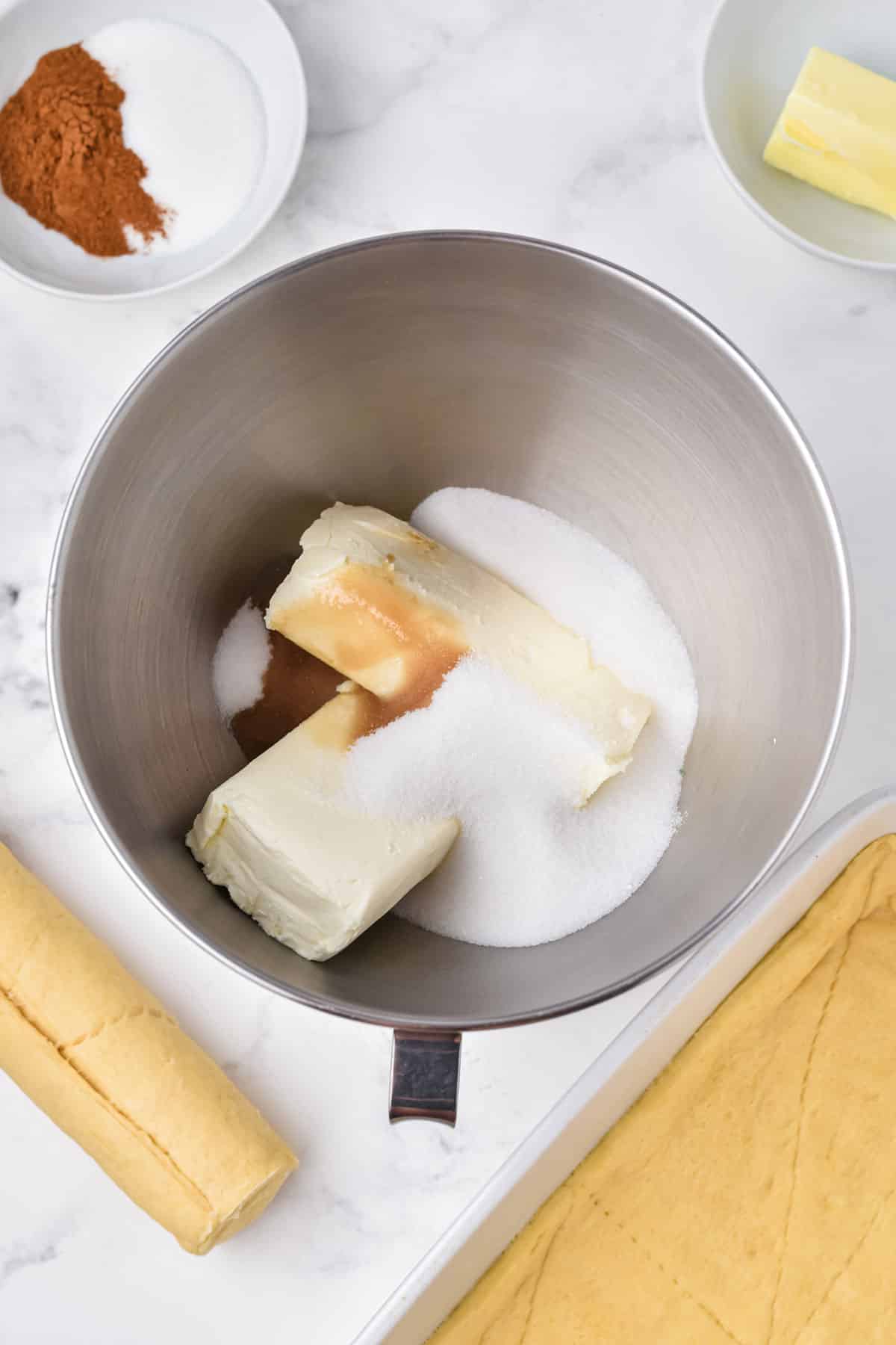 Process of preparing Crescent Roll Cheesecake Bars is to mix all the ingredients in a bowl