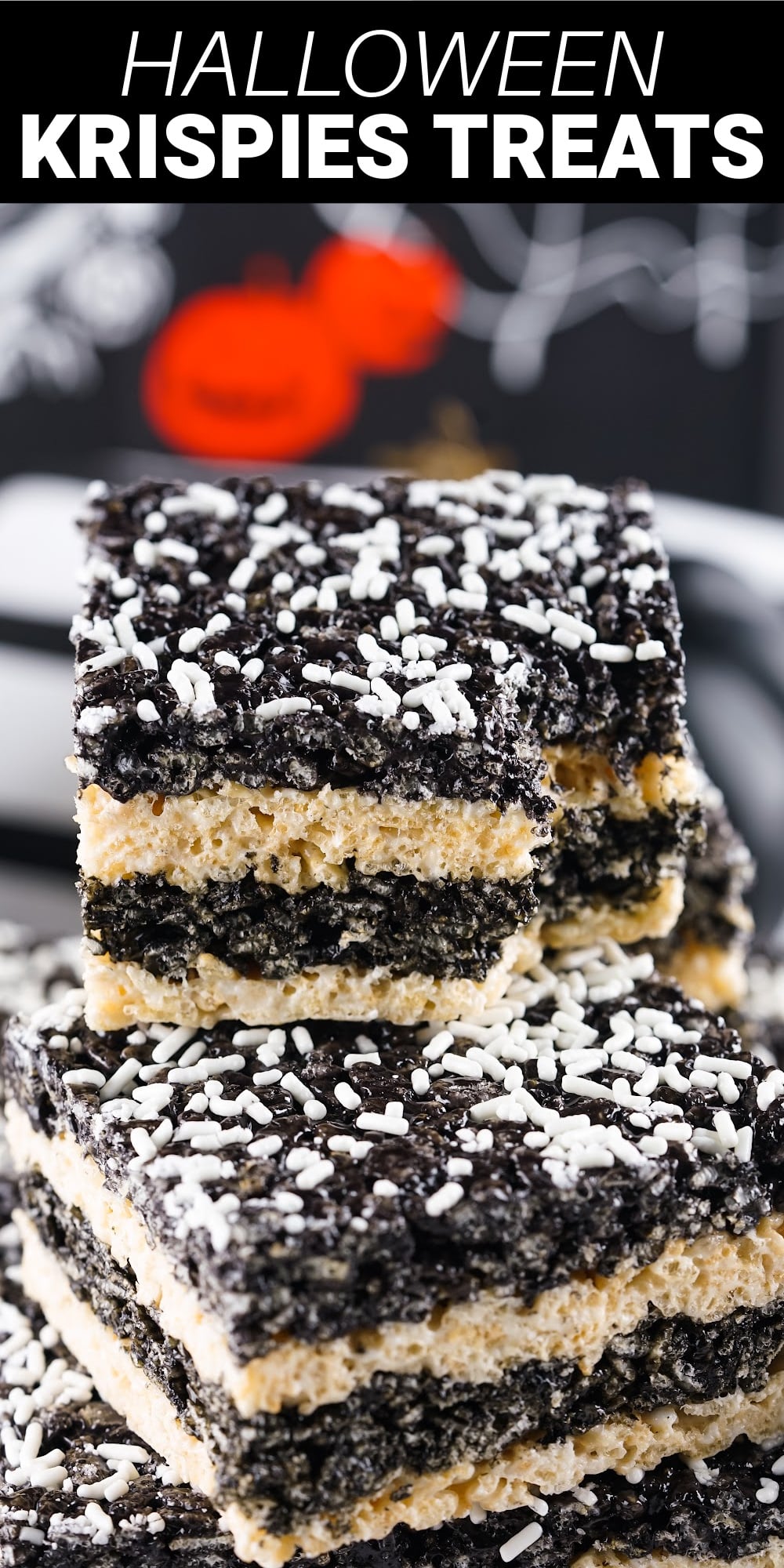 These Halloween Rice Krispie treats give the classic party dessert a fun Halloween makeover. They have the same buttery marshmallow taste and perfect chewy texture that everyone knows and loves, with a bold layered look that makes them a perfect choice for Halloween.