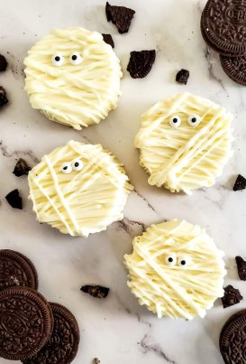 white chocolate covered oreos with candy eyes