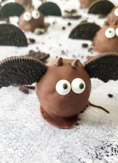 brown truffle with candy eyes and Oreo bat wings