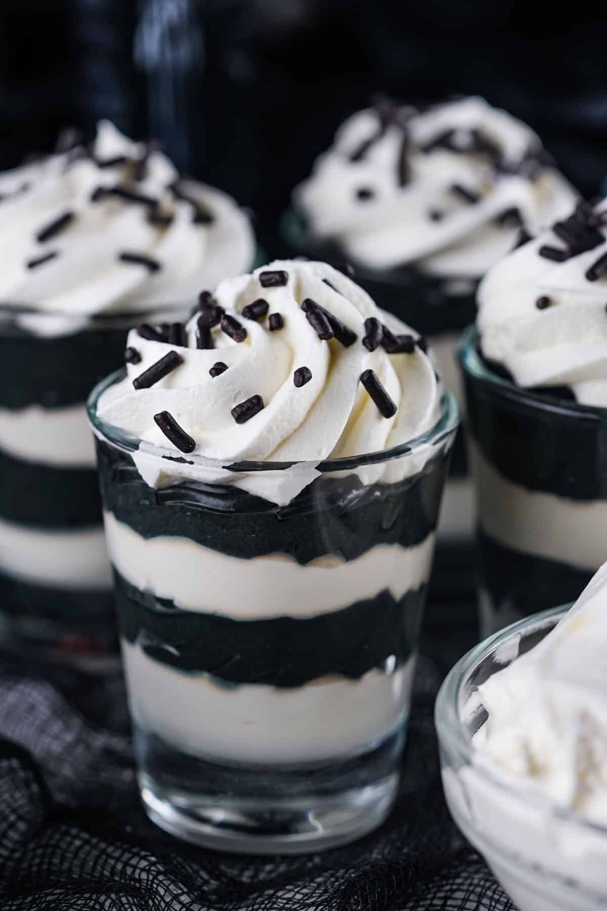 black and white layered shots with whipped cream