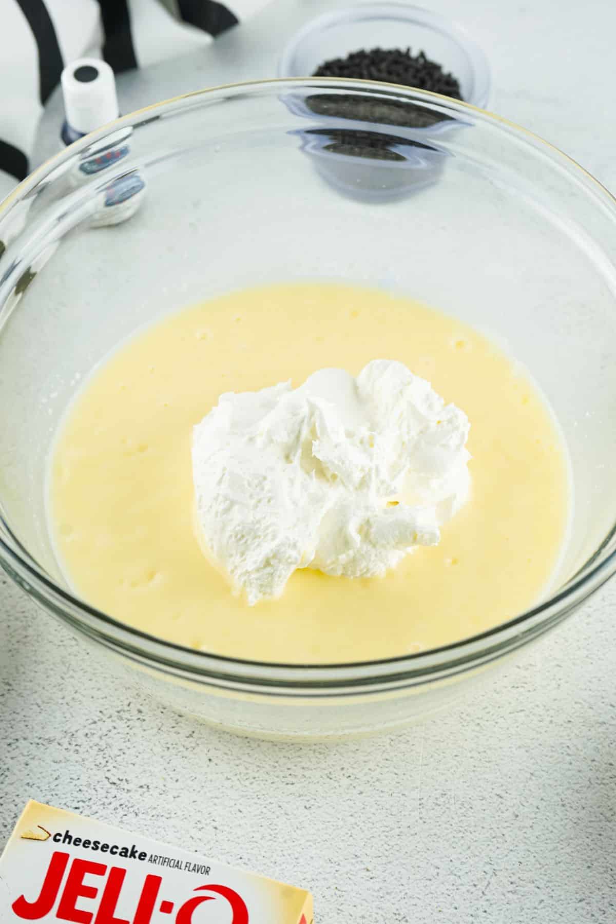 whipped cream in bowl with pudding