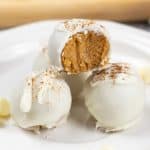 three round white chocolate covered truffles