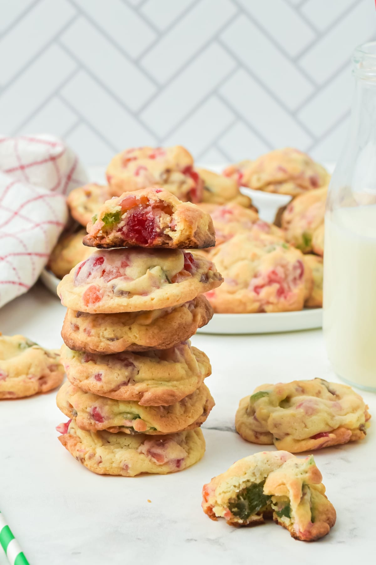 A pile of Fruitcake Cookies on a white counter