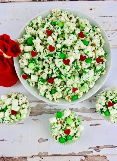 Small and large servings of Grinch Popcorn on a table