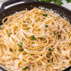 skillet with pasta and alfredo sauce