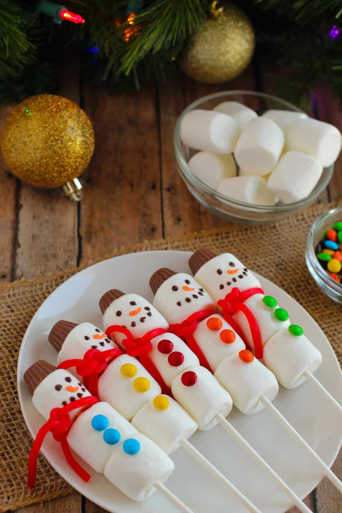 snowman popsicles laying on plate