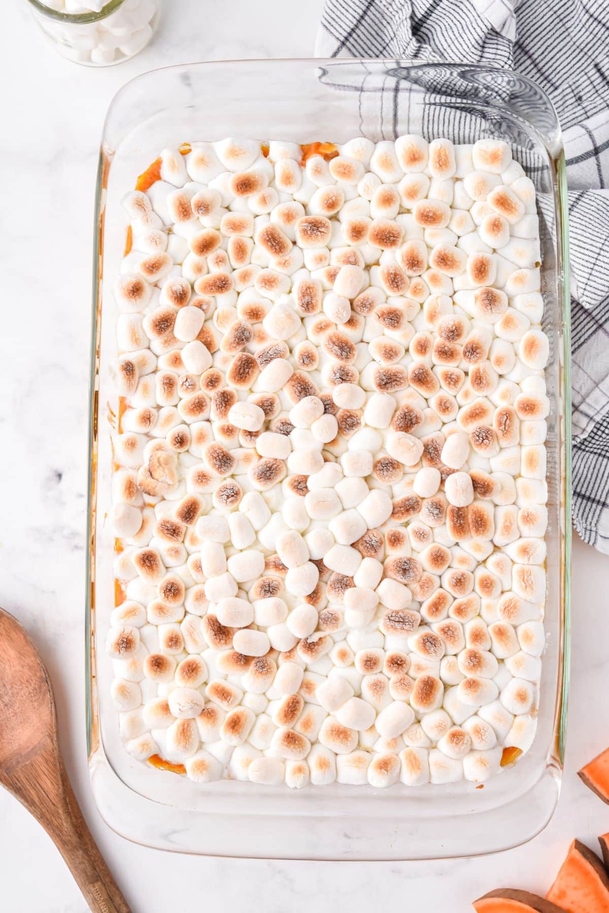 top down picture of golden marshmallows on the top of sweet potato casserole