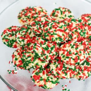 red green and white sprinkle cookies on plate