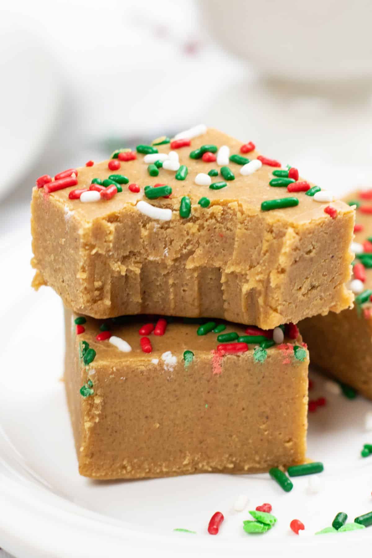light brown fudge squares with a bite out