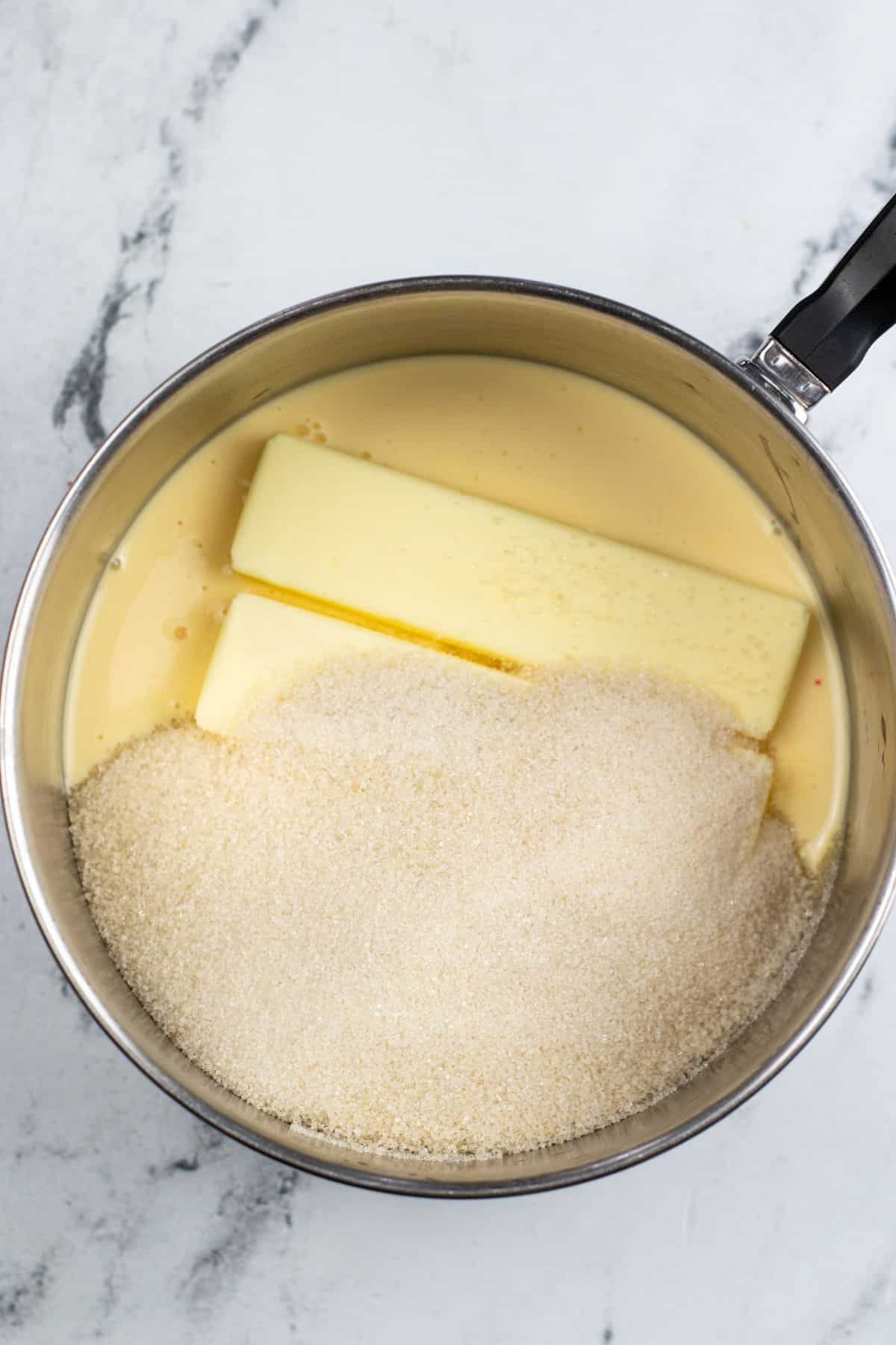butter and sugar in saucepan