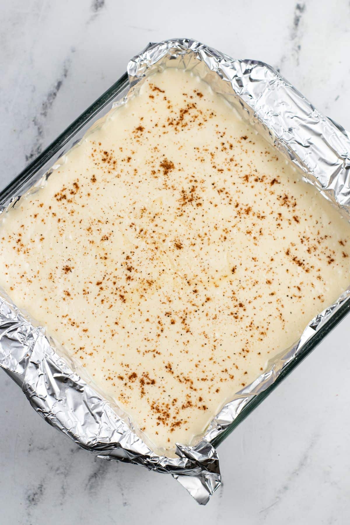 white fudge with nutmeg in pan