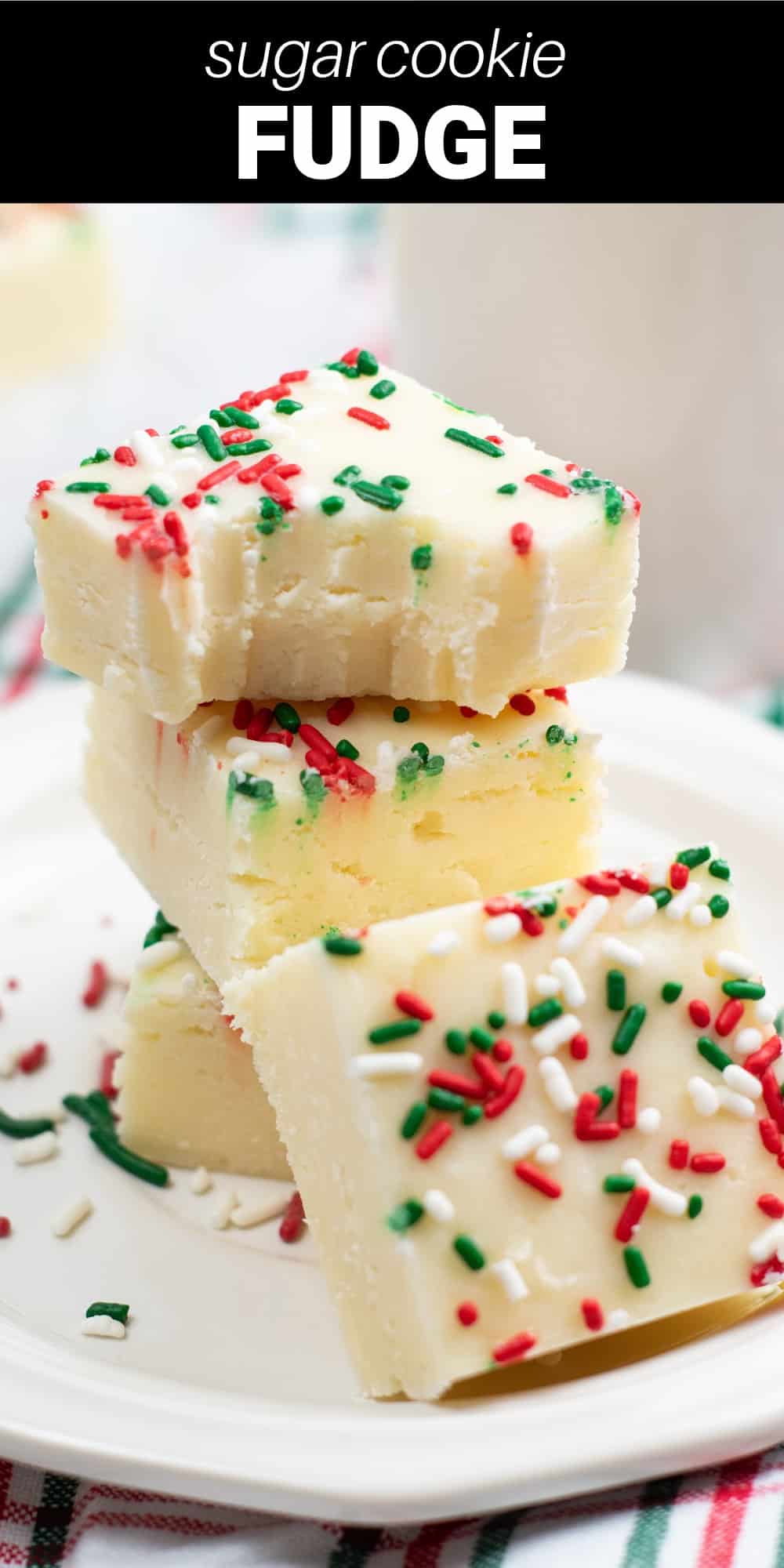 This velvety smooth Sugar Cookie Fudge is a rich and decadent white chocolate fudge with delicious sugar cookie flavor. Festive sprinkles add the finishing touch to make it the perfect sweet treat to give as an edible gift or to add to your dessert table this holiday season.