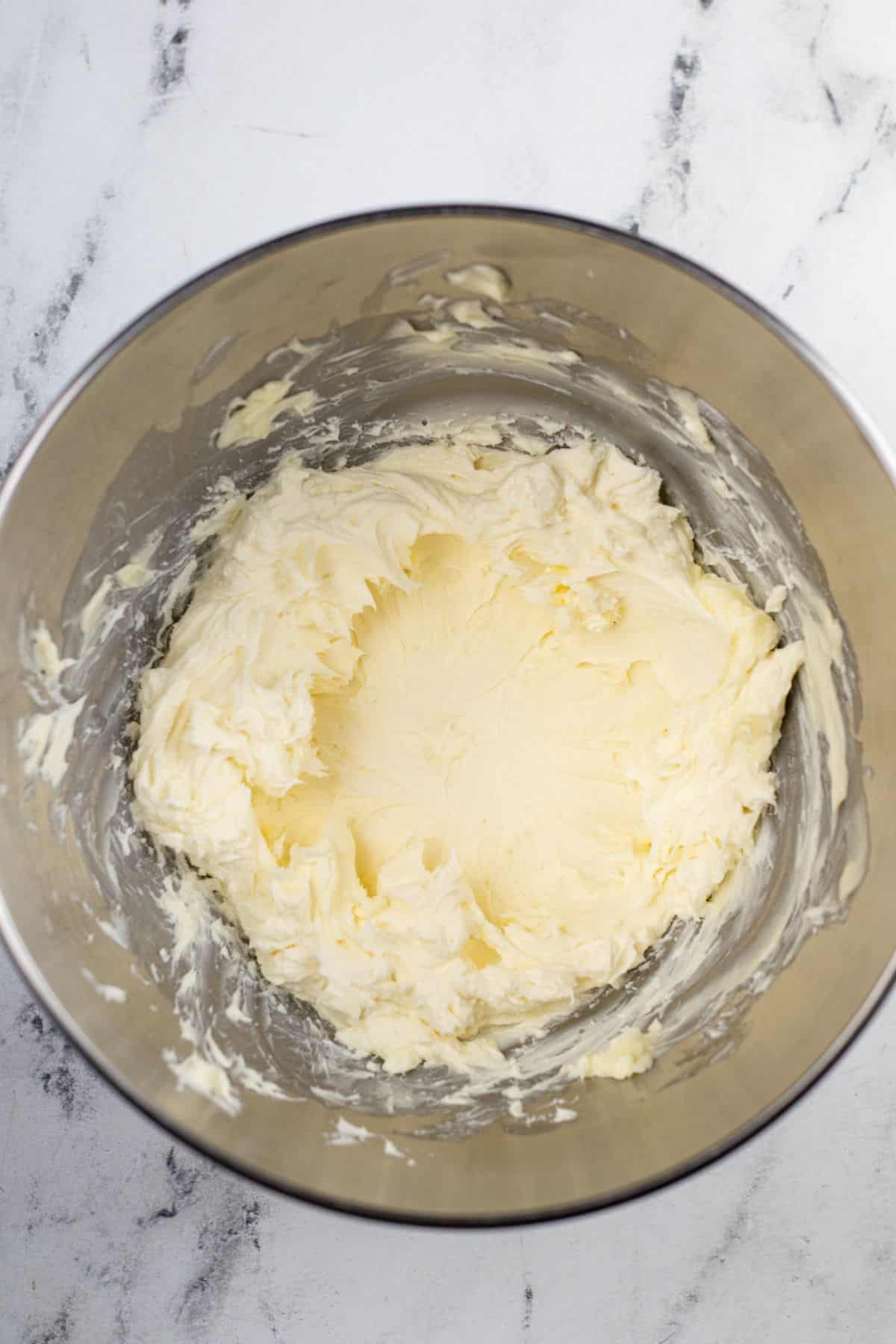 creamed butter in mixing bowl