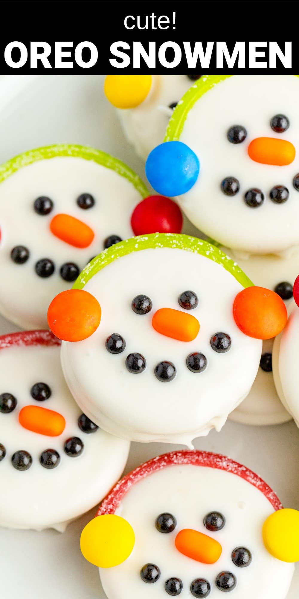 White chocolate Oreos decorated like snowmen. Perfect treat the kids can help with!