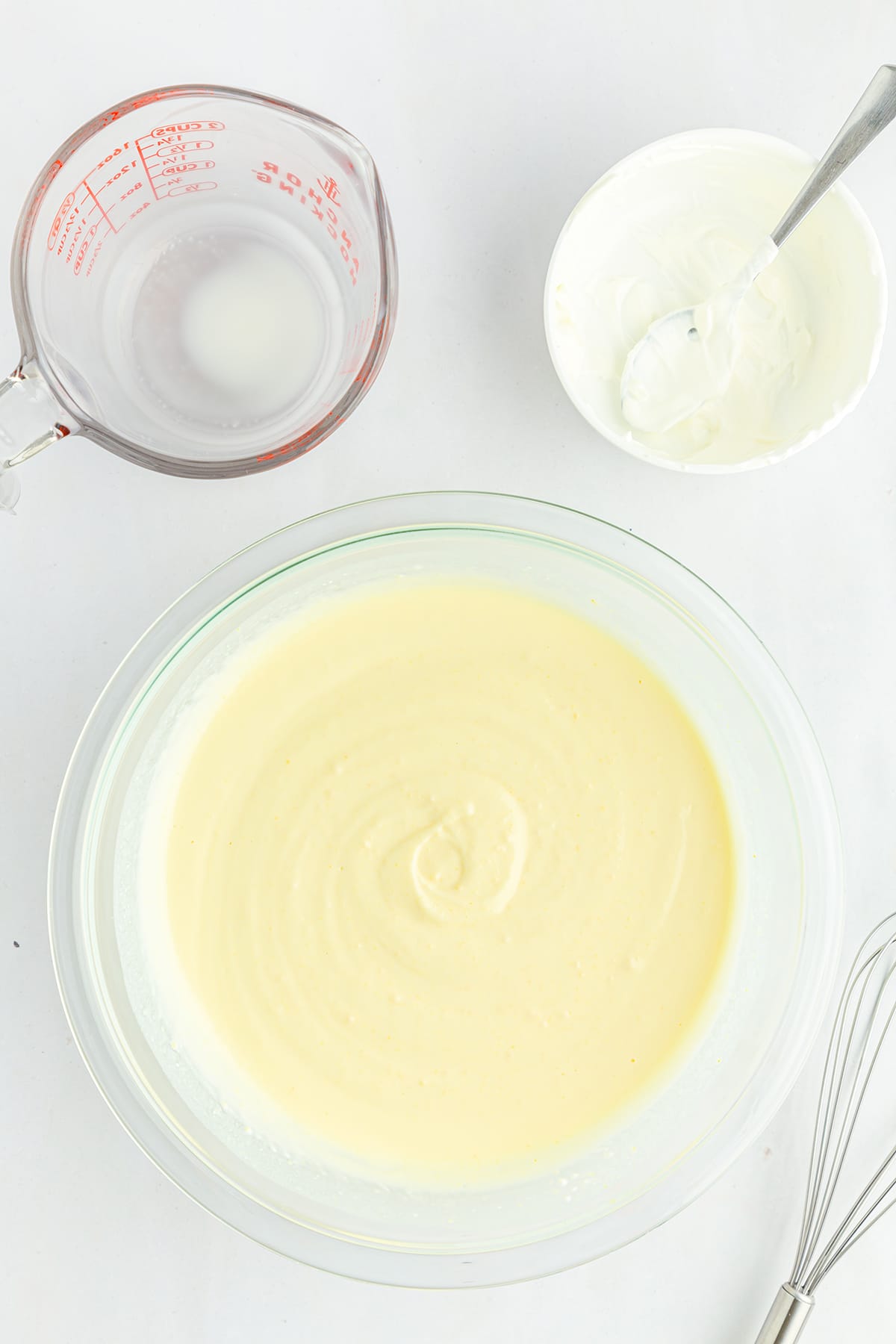 A thick and creamy pudding mixture in a large bowl