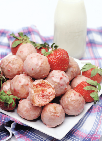 A closer look of Strawberry Donut Holes with real stawberries