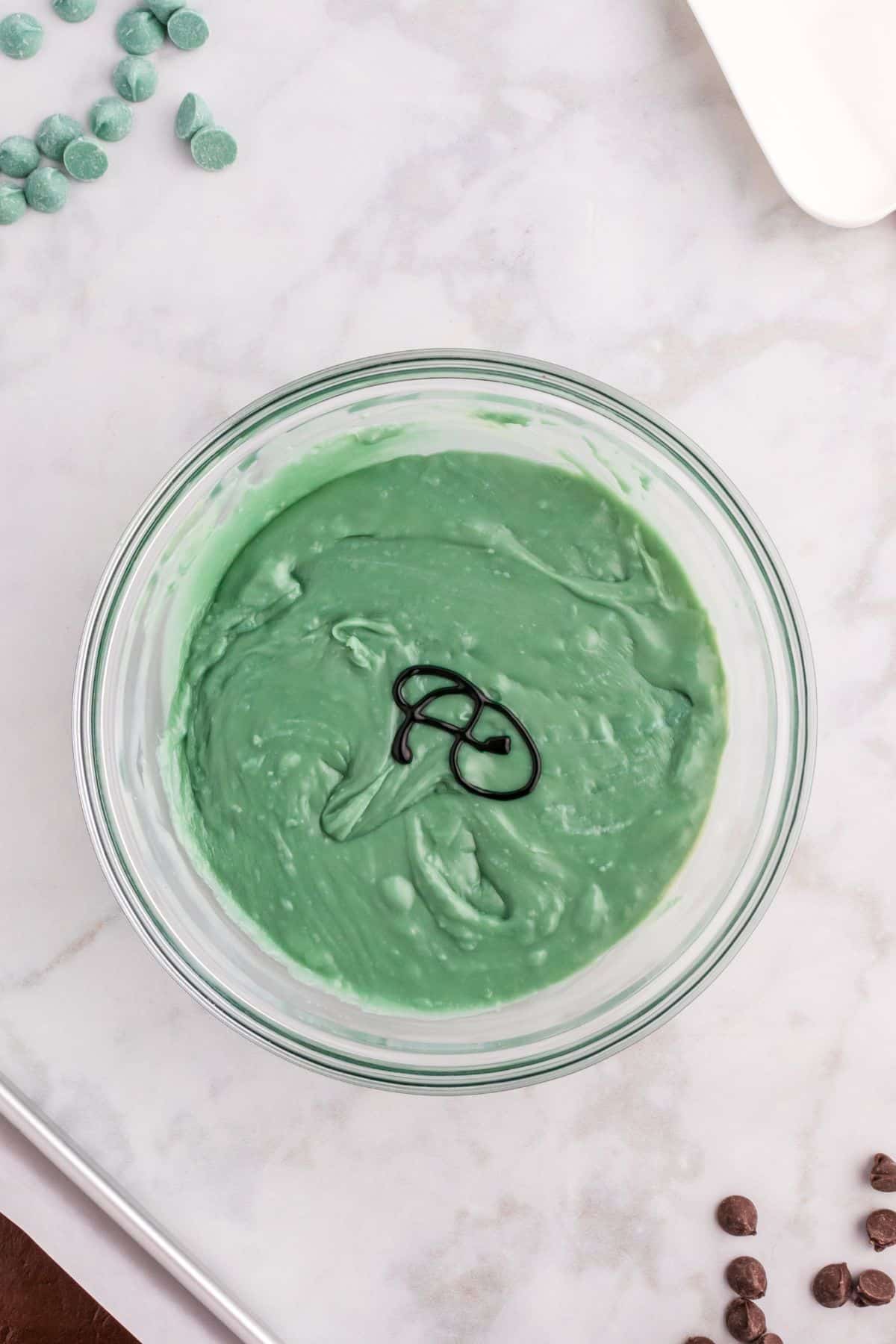 green fudge mixture in glass bowl