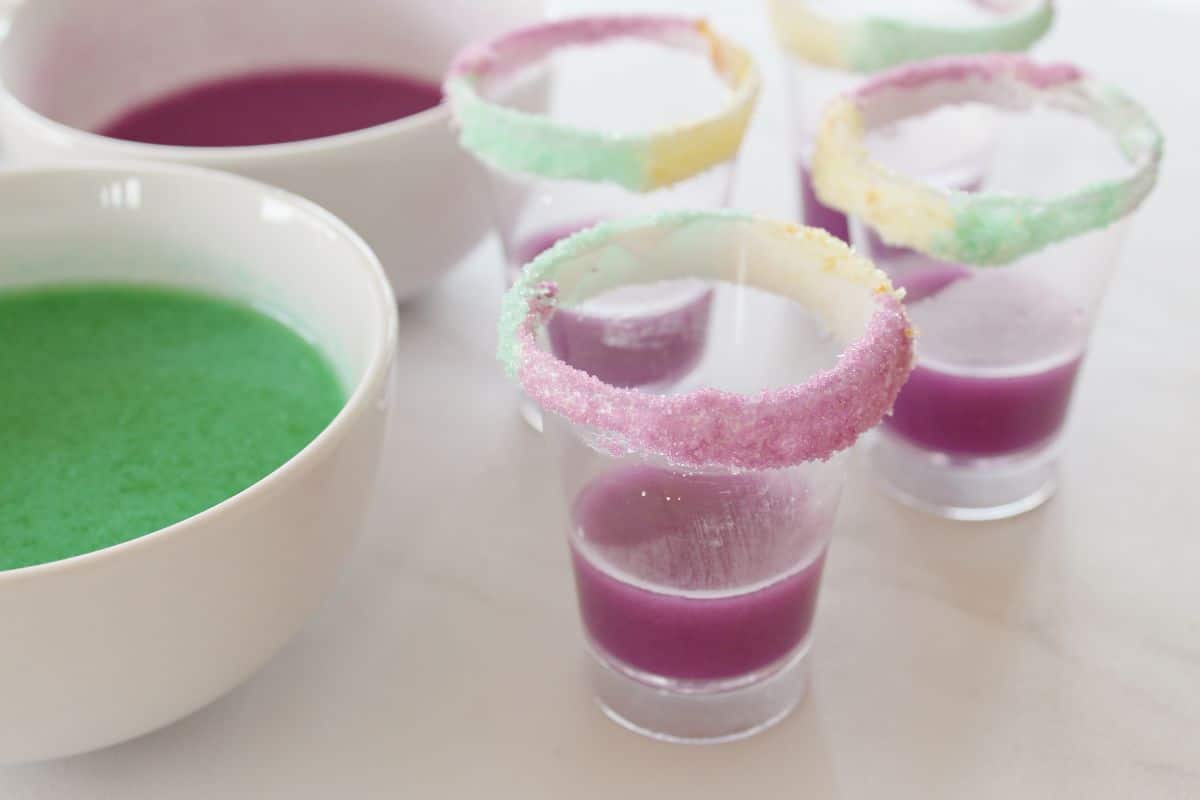 purple pudding in bottom of shot glasses