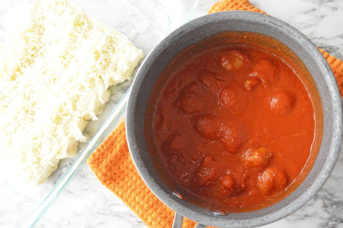 red sauce and meatballs in saucepan