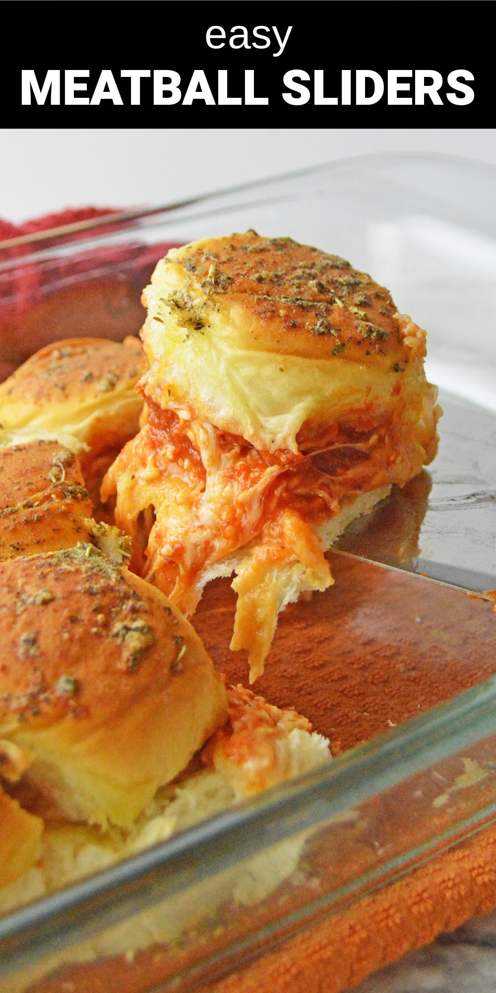 These easy cheesy pull apart Meatball Sliders are filled with tender and juicy meatballs, topped with gooey cheese and tangy pasta sauce sandwiched in pillowy soft rolls. They're perfect for party appetizer, game day food, or a quick dinner the whole family will love.