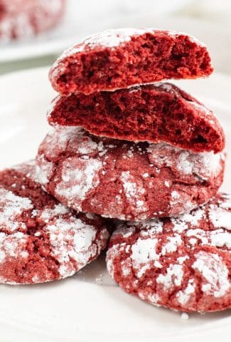 red cookies stacked on plate
