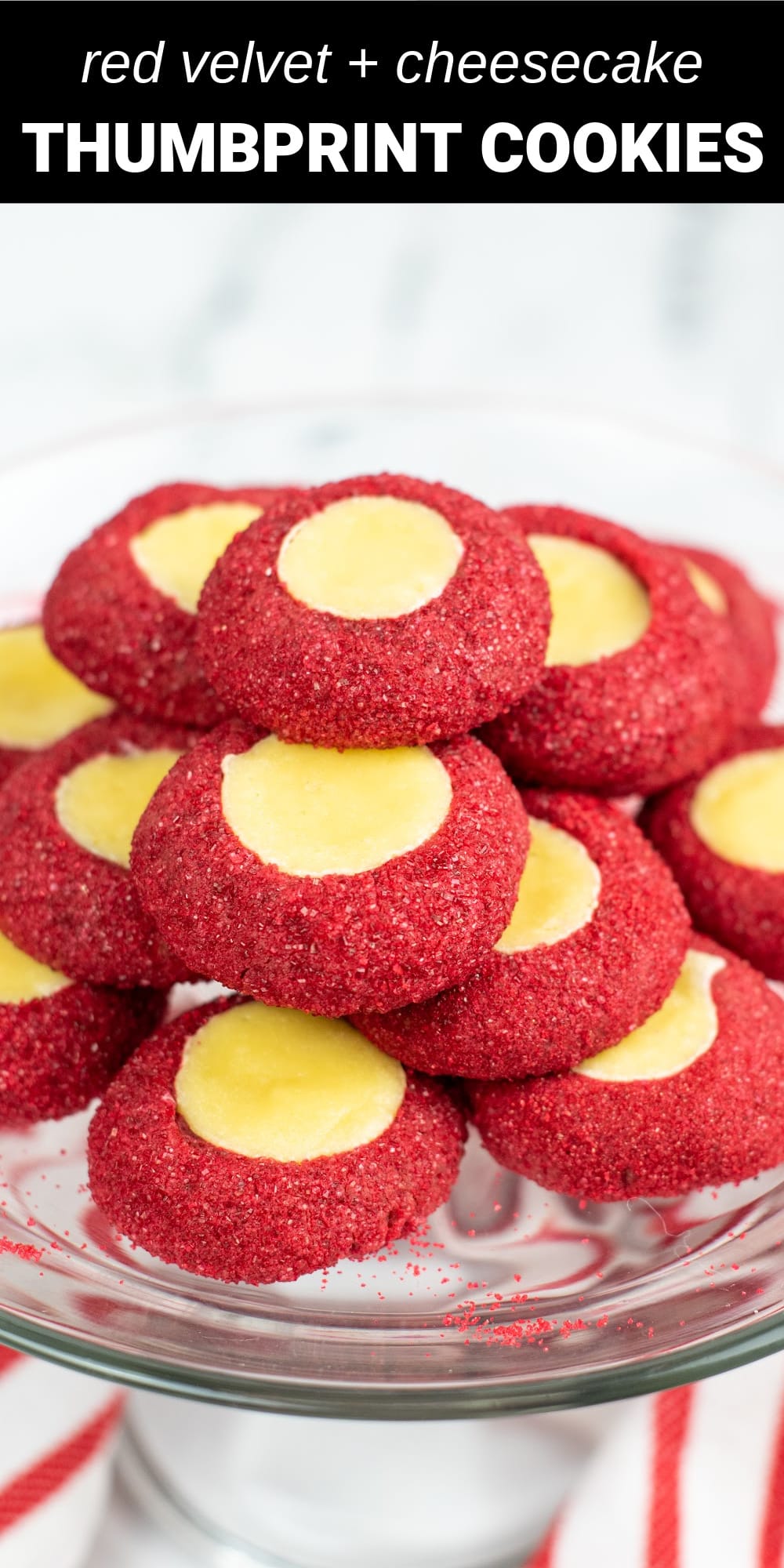 These from-scratch Red Velvet Thumbprint Cookies are soft and chewy, with a subtle hint of chocolate and sweet cream cheese center. 