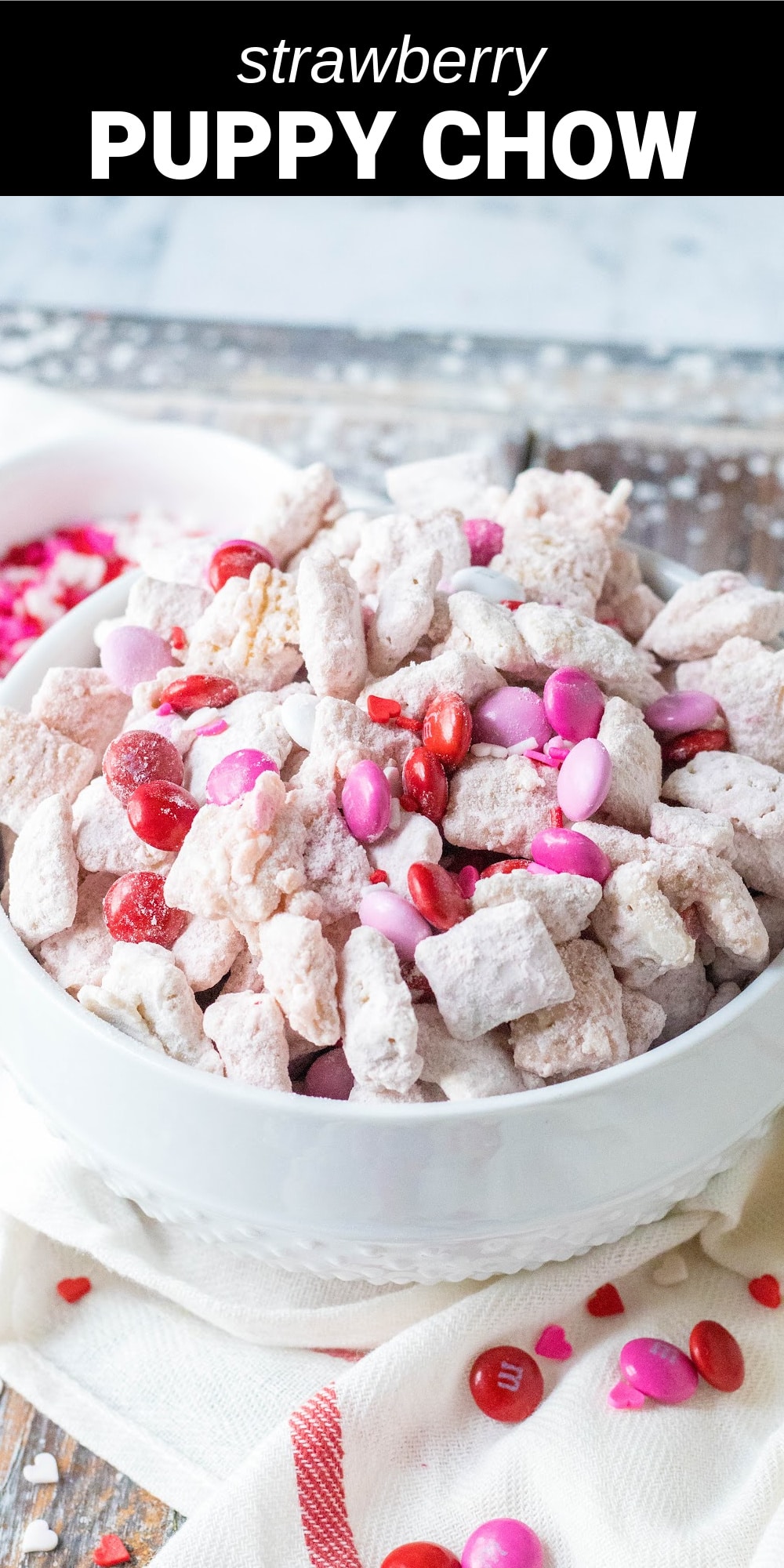 This strawberry puppy chow is an incredibly delicious sweet snack mix that’s perfect for your Valentine’s Day festivities. Crunchy Rice Chex cereal is coated in creamy white chocolate, then tossed with a mixture of powdered sugar, strawberry cake mix, pink and white M&Ms, and Valentine's sprinkles for a crunchy and sweet treat that you won’t want to put down.