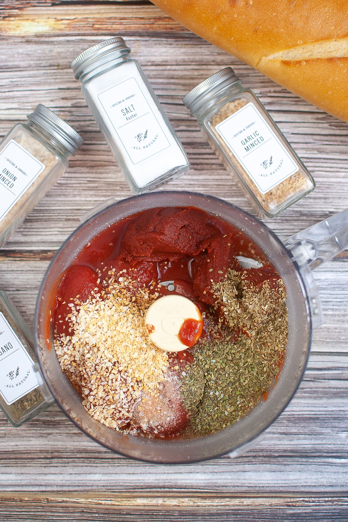 Tomato sauce and paste with the seasonings in a blender