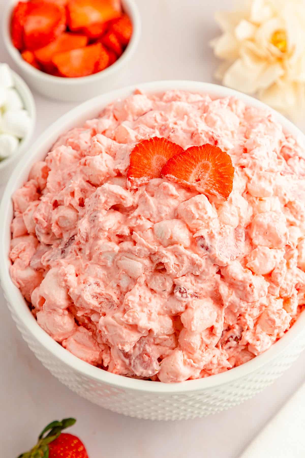 A creamy delicious Strawberry Fluff Salad in large white bowl