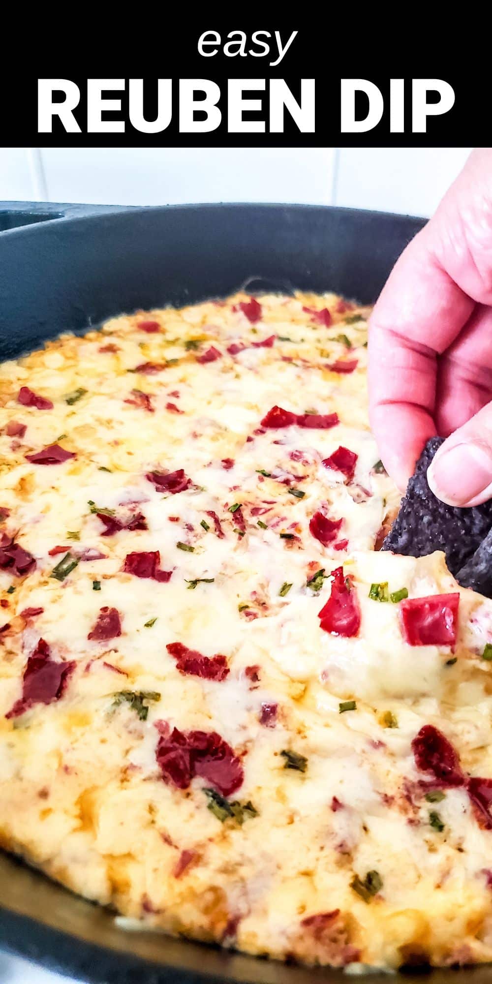 Reuben sandwich lovers will go crazy for this amazing hot Reuben Dip! Loaded with tender corned beef, tangy sauerkraut and Thousand Island dressing, this recipe has all the same wonderful flavors of a classic reuben sandwich, but in the form of a warm, cheesy and delicious dip. 