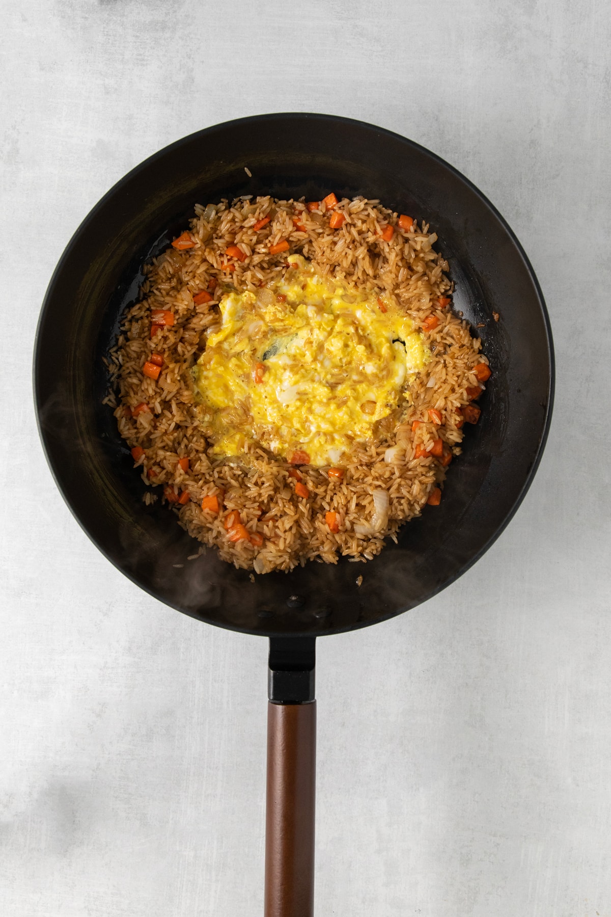 Adding egg to Easy Egg Fried Rice recipe