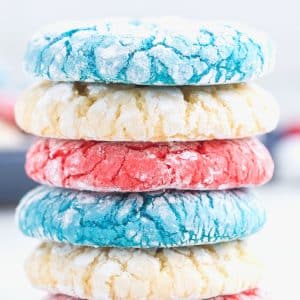 blue, white, and red crinkle cookies stacked