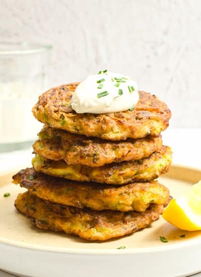 A pile of Zucchini Fritters on a plate