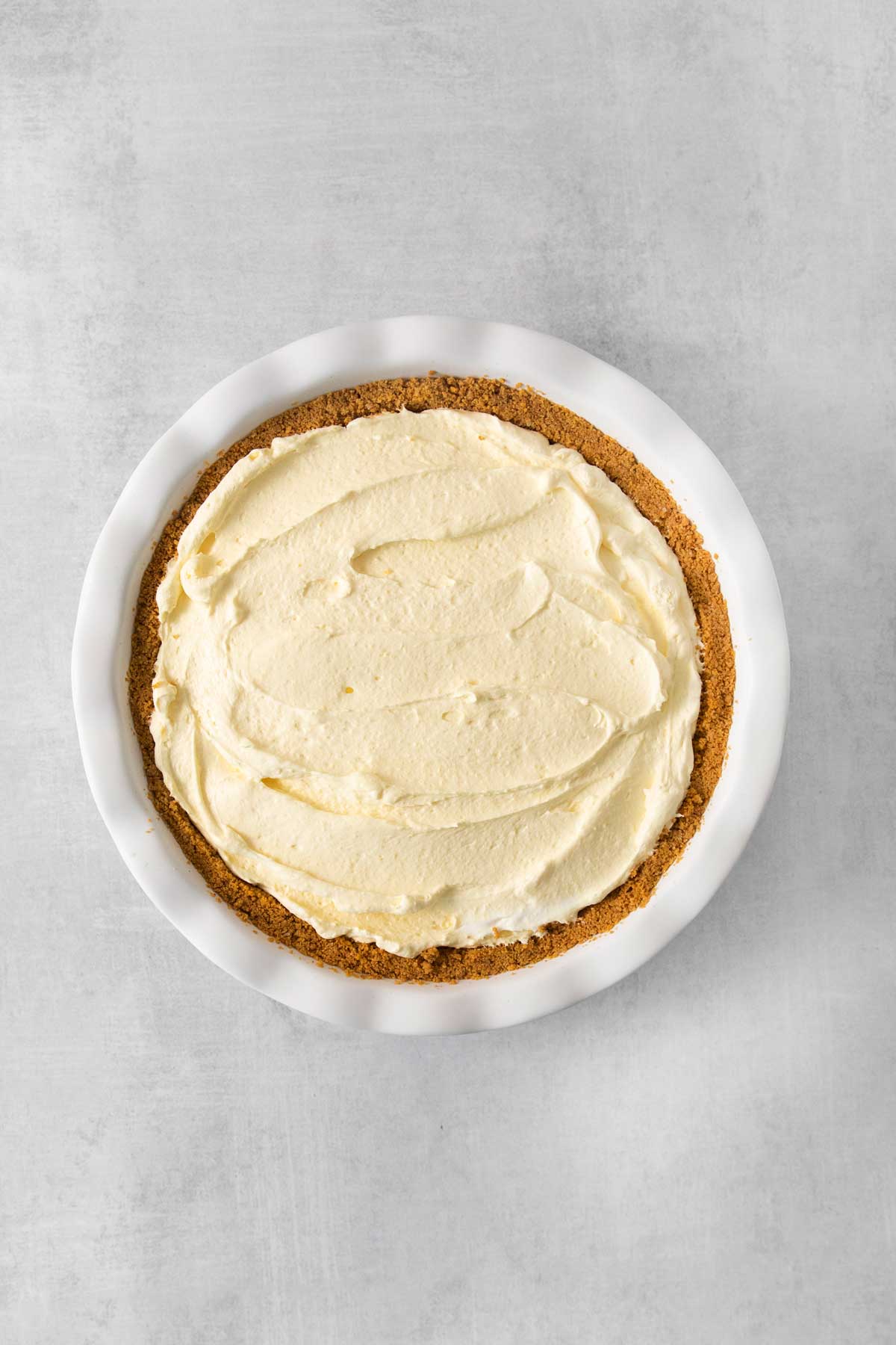 Next step is to making the perfect Banana Pudding Pie is to add the whipped cream.