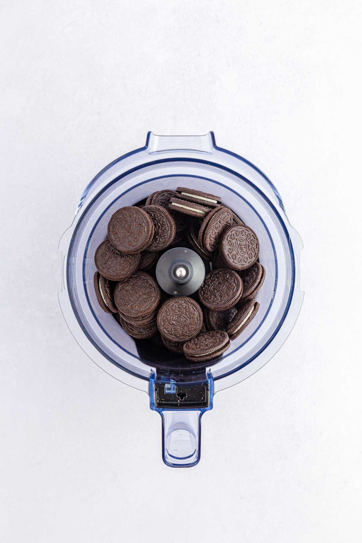 One process of preparing Easter dirt cups is to put the Oreos in the food processor