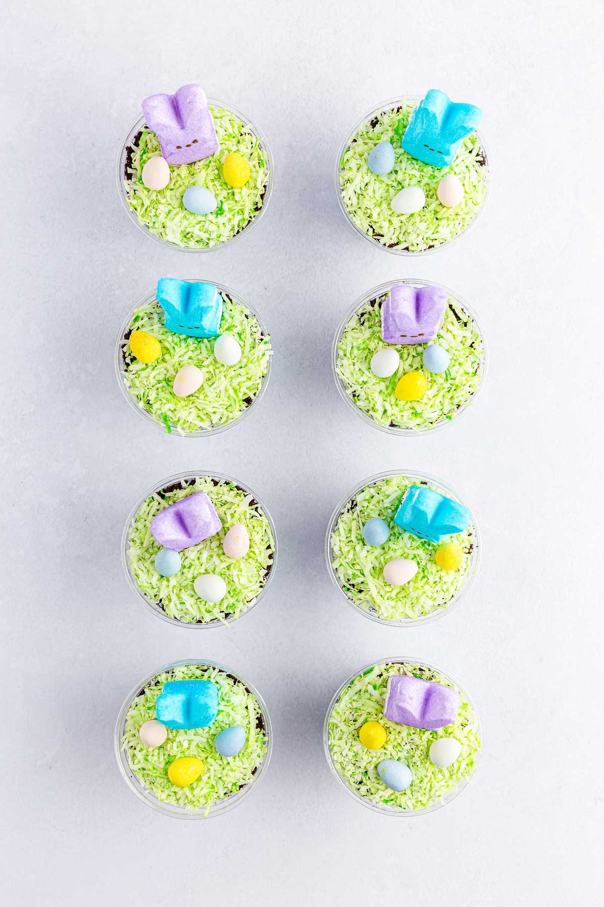 Servings of Easter Dirt Cups on a white counter