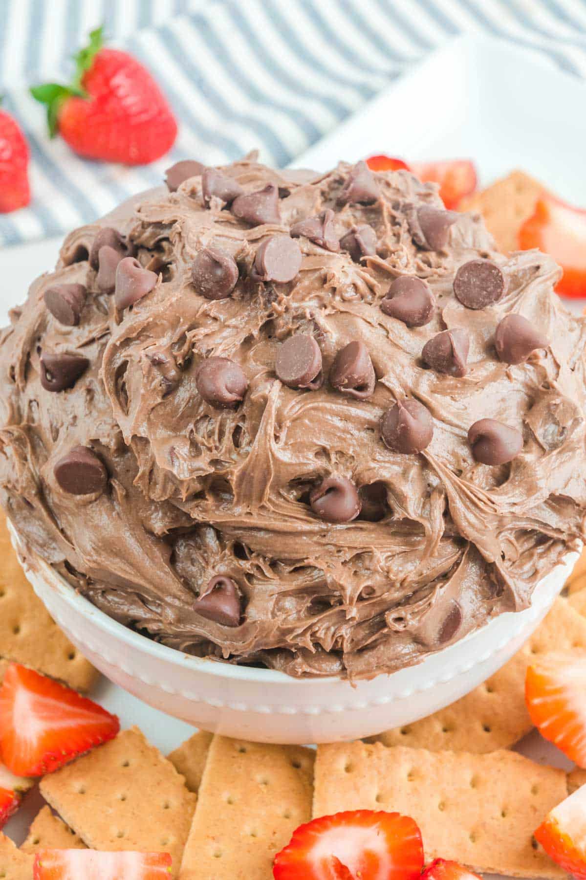 close up of chocolate fluffy dessert dip with chocolate chips on top