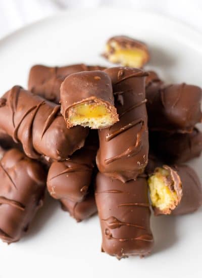 chocolate covered Twix bars on white plate