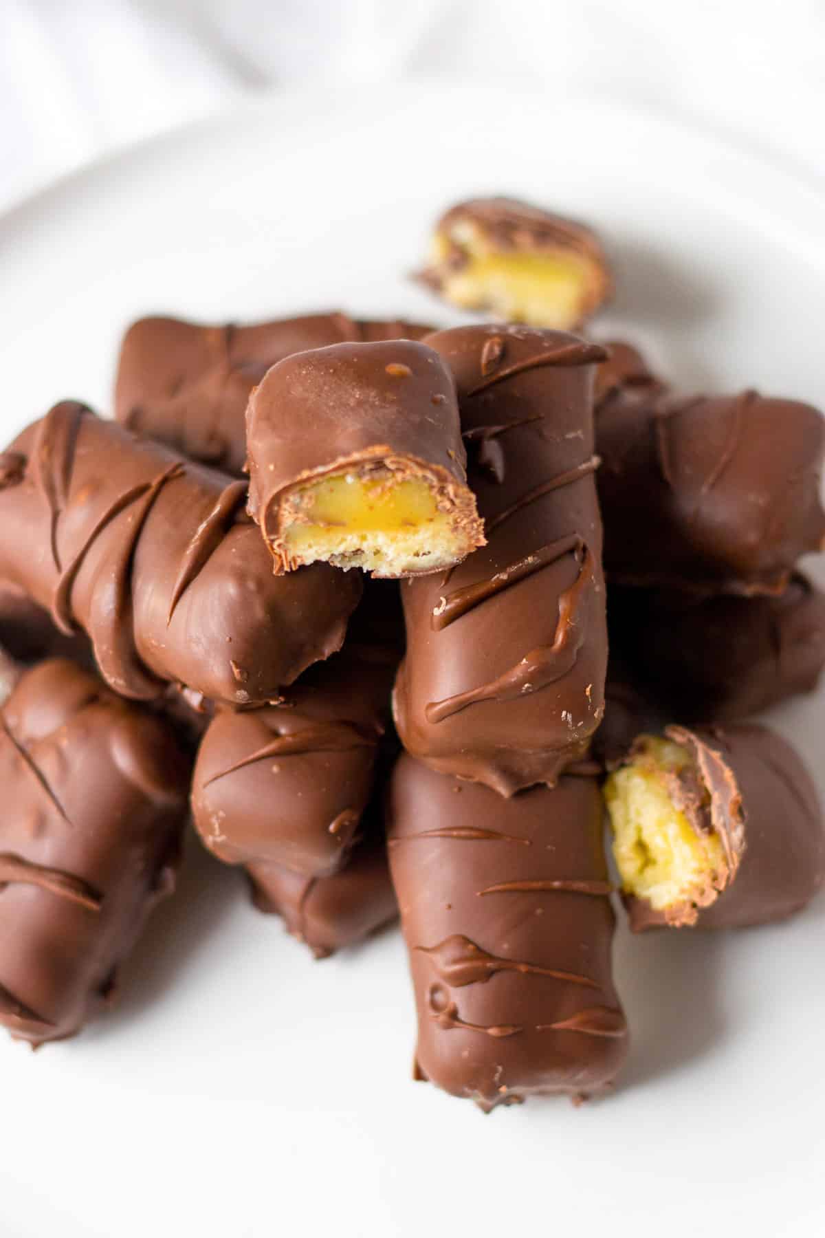 chocolate covered Twix bars on white plate