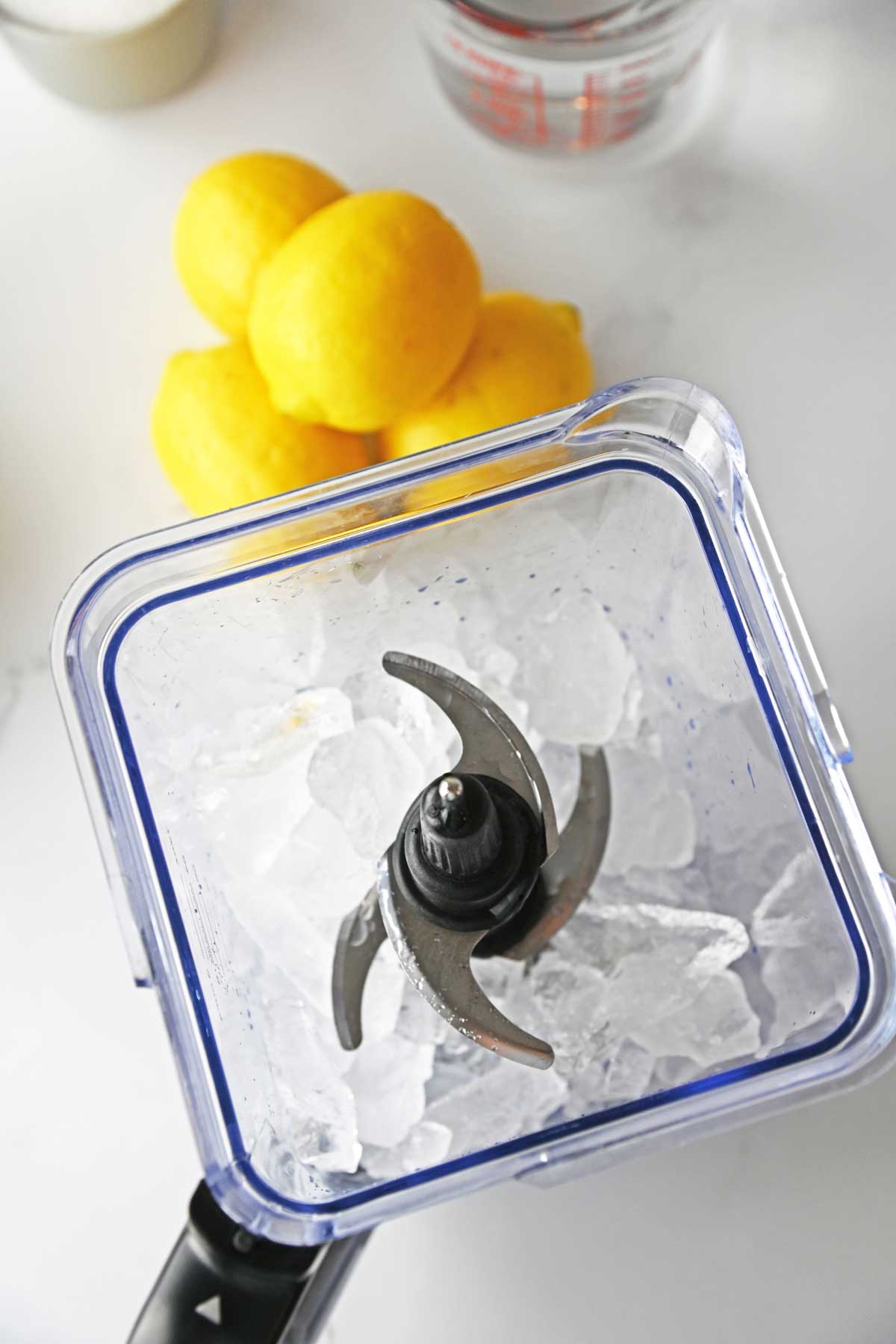 The process of preparing Lemonade Slushie is to add an ice.